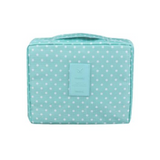 Trousse de toilette bleue à pois